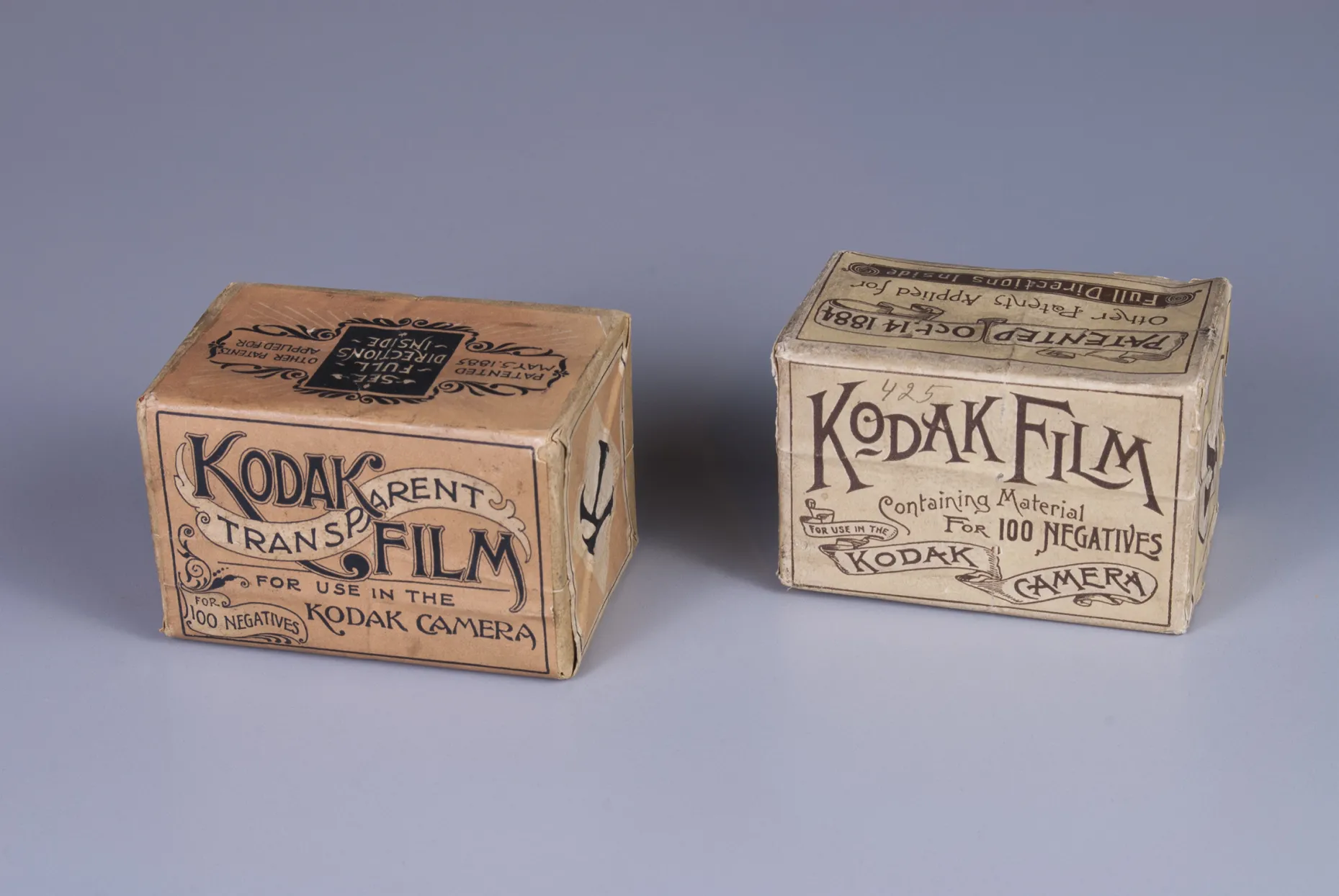 Two unopened Kodak film boxes, one from 1889 that contains a roll of transparent film (left), and one from 1888 with normal film (right). Source: Eastman Museum, Rochester